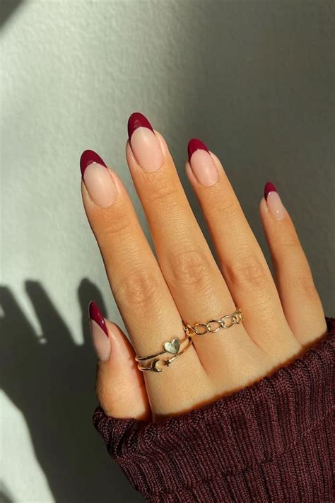 french manicure with burgundy tips.